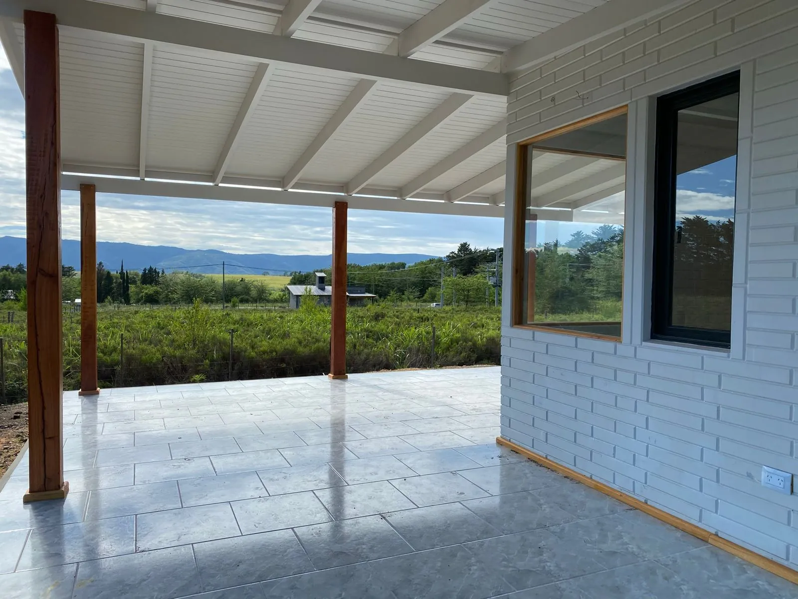 Covered terrace with countryside view